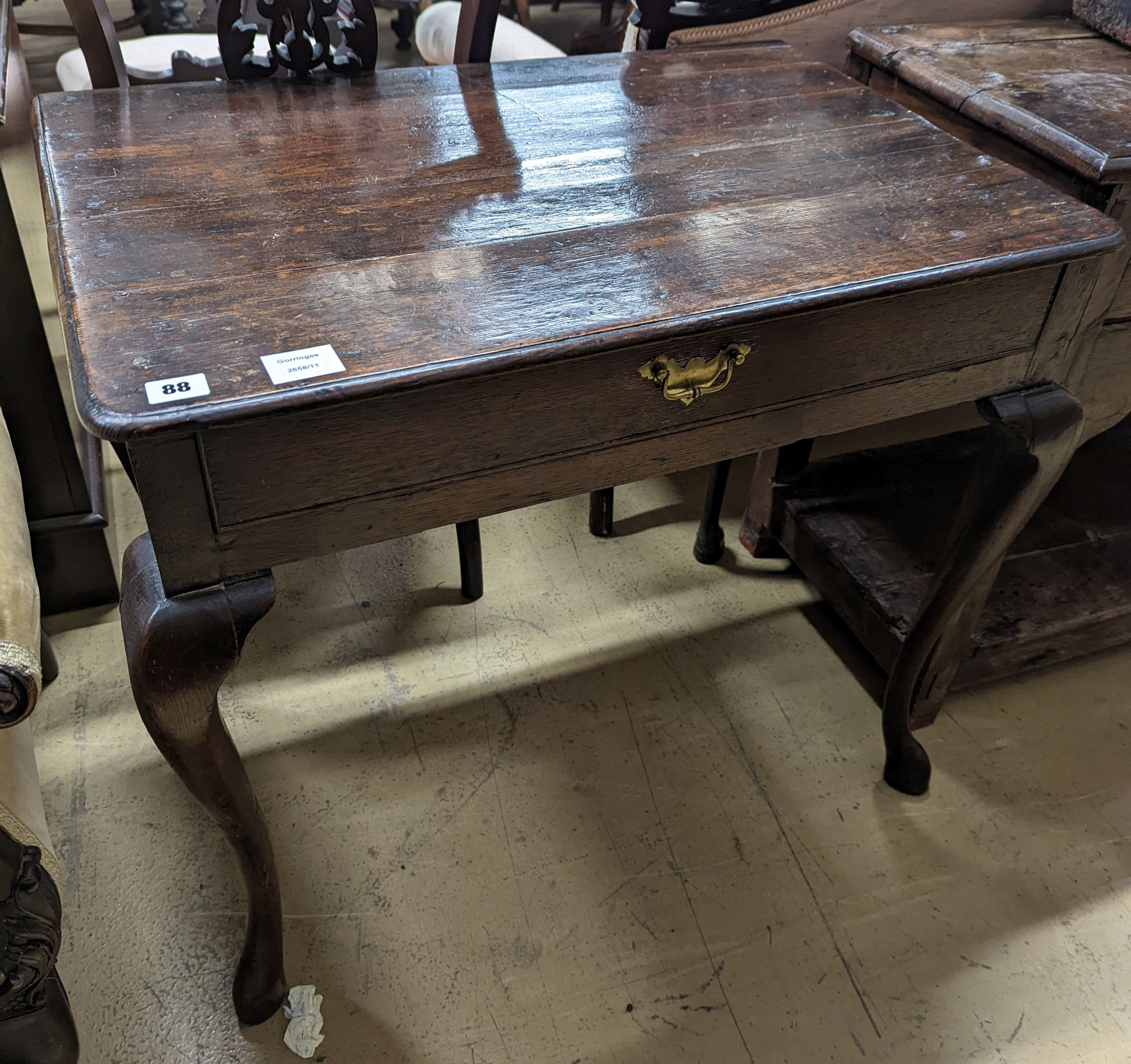 A mid 18th century oak lowboy, width 74cm, depth 50cm, height 69cm